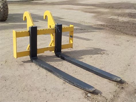 cat skid steer forks|long forks for cat 930.